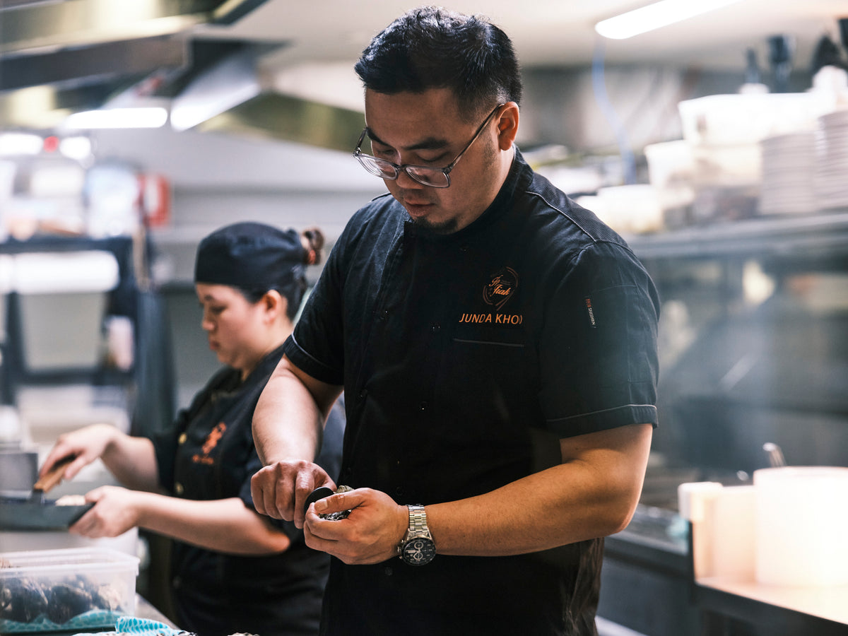 Professional chef preparing to cook instantly on Luus Induction
